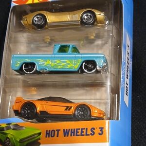 Hot Wheels 3.  Die-Cast Cars - Gold corvette, Blue/green Chevy Truck. Orange Car